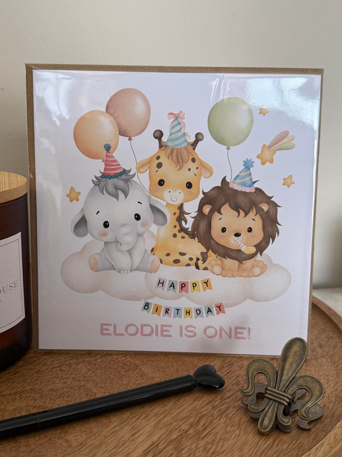 Personalised luxury first birthday card, party animals design