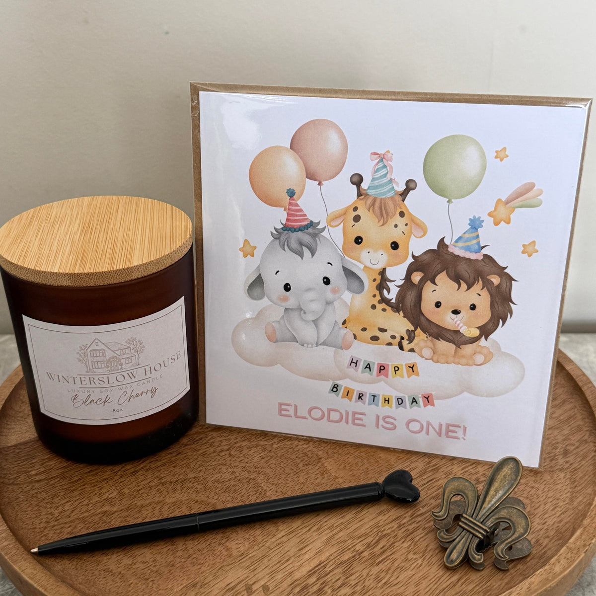 Personalised luxury first birthday card, party animals design